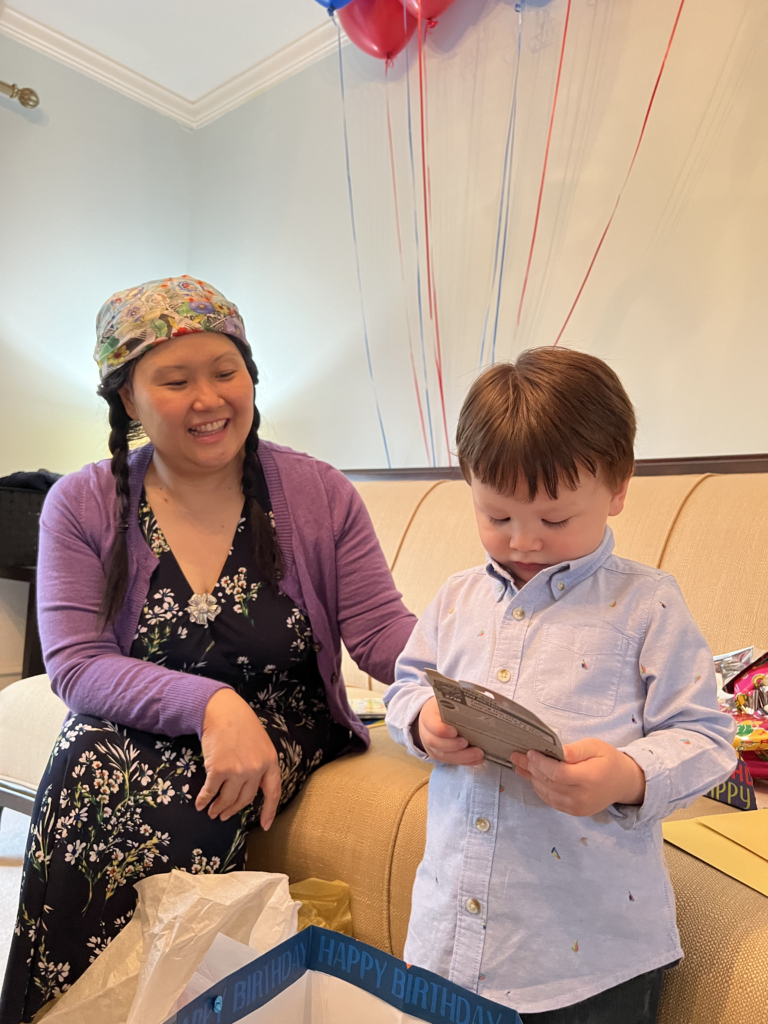 Vivian Cheng Larsen playing with her young son